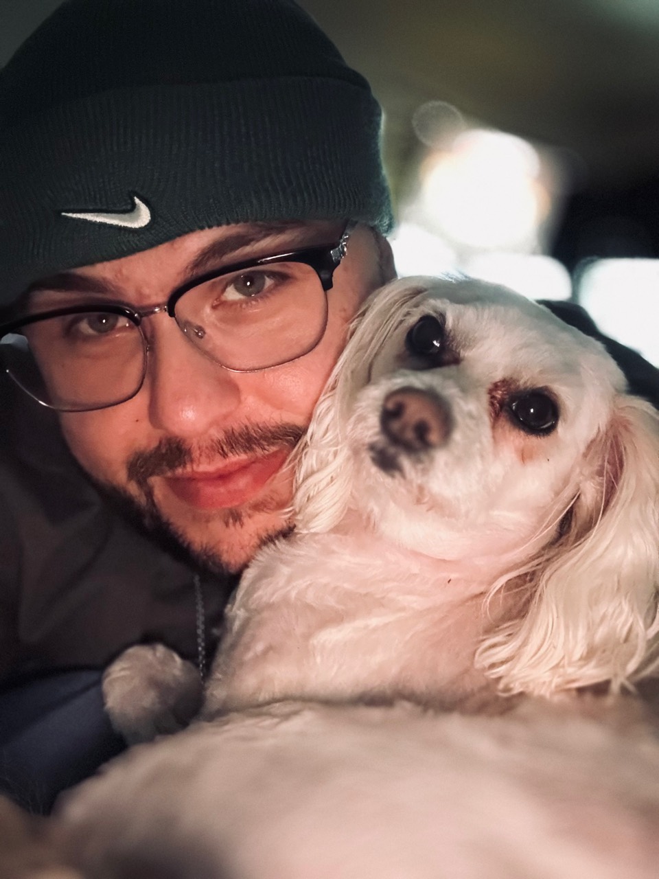 Christian and Nova cuddled up together